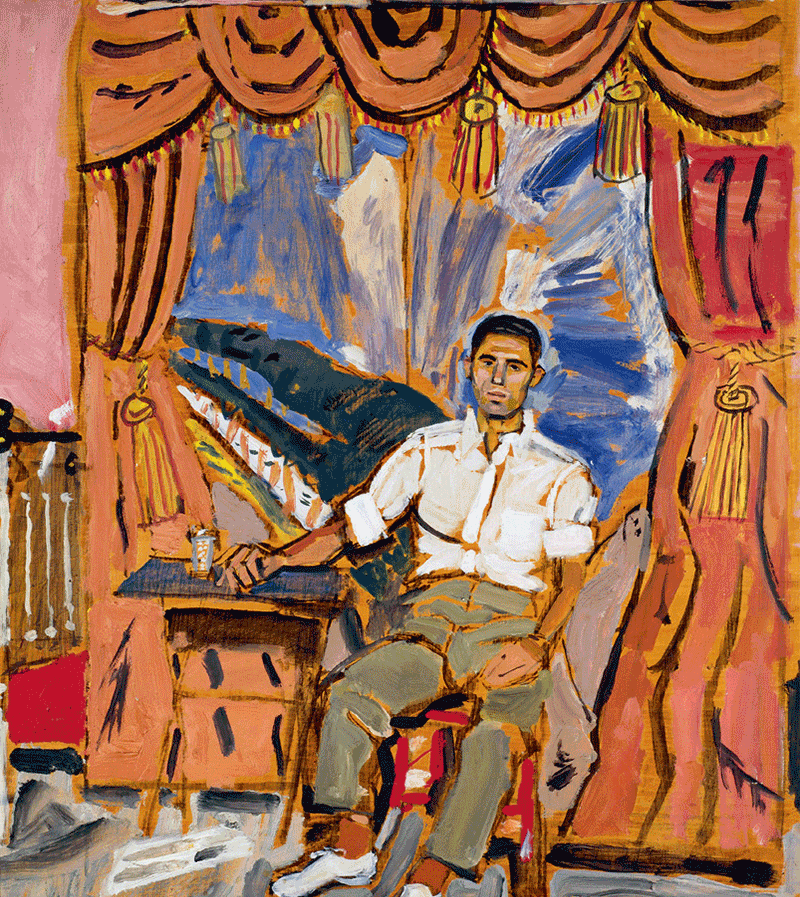A man sitting infront of a stage set